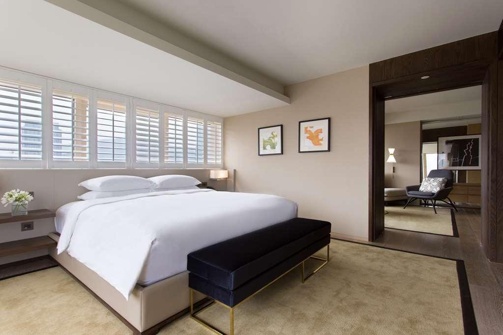 Grand Hyatt Taipei Quarto foto A bedroom at the hotel